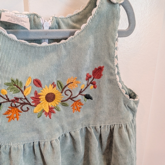Girls Green Corduroy Jumper  Dress With Embroidered Sunflower Leaf Floral Design - Picture 5 of 8